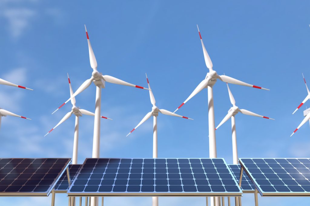 Solar panels and wind turbines — green and renewable energy concept