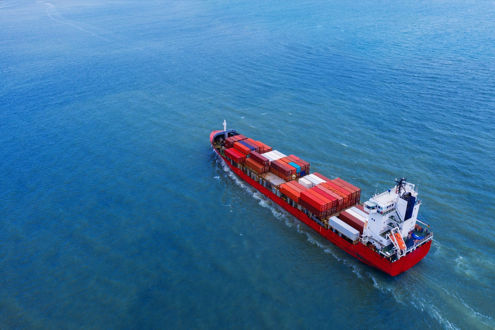 Aerial view of a container cargo ship rerouted around the cape of good hope after red sea attacks