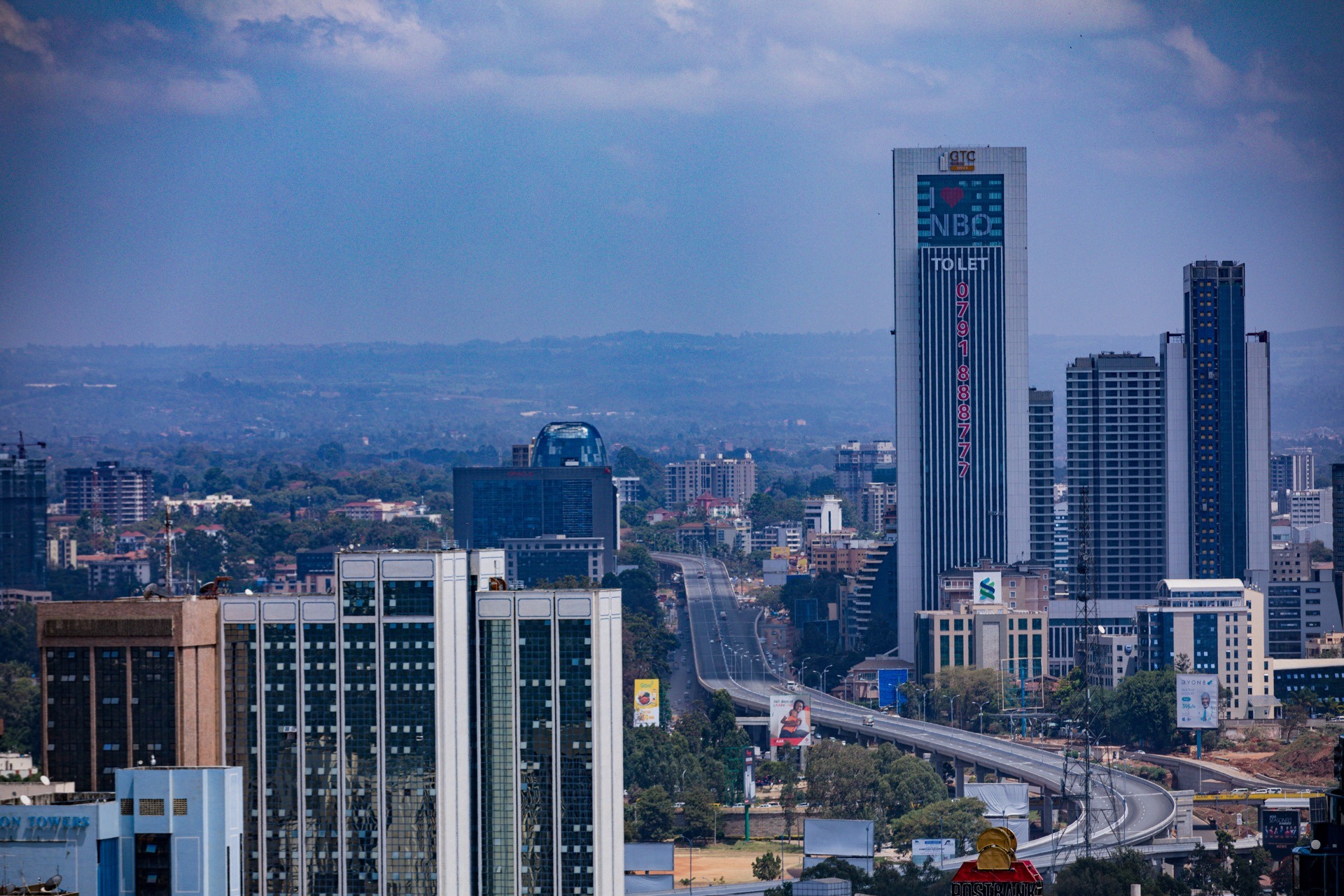 African business district cityscape — commercial property and office buildings insured against business risk