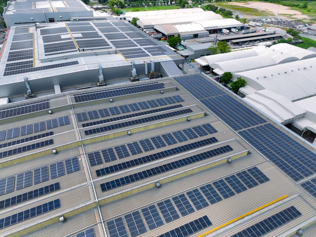 Commercial rooftop solar pv installation on a warehouse — the type of installed asset that a commercial insurance review should reflect